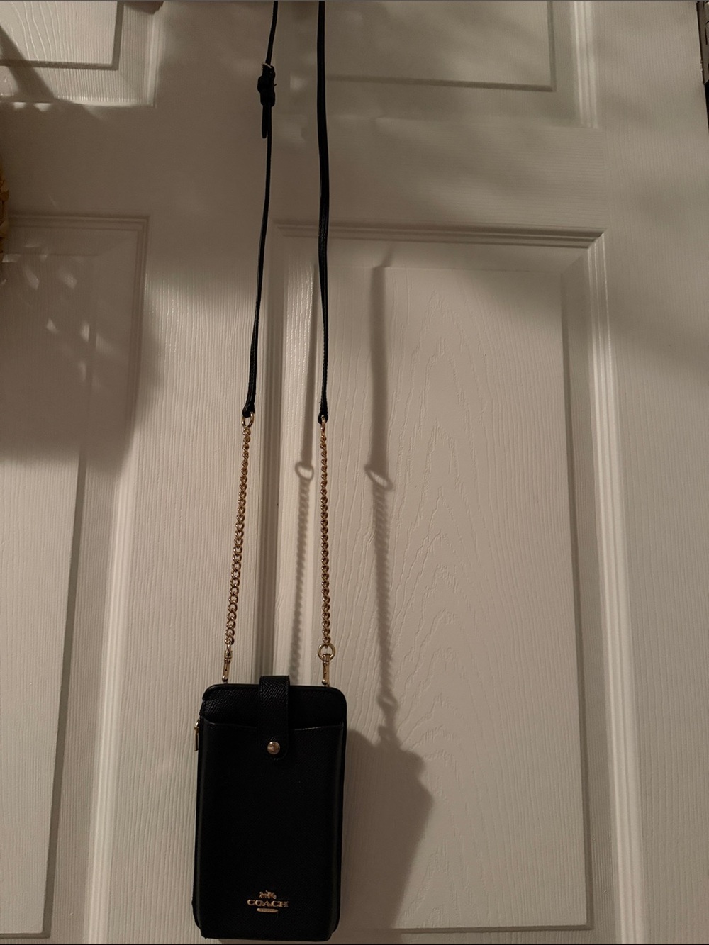 Coach Black Crossbody Phone Pouch with Gold Chain Accent